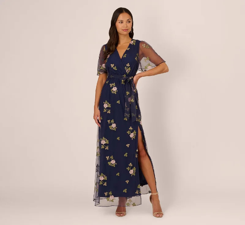 Spring dresses with empire waistlines for added comfort -Floral Embroidered Maxi Dress With Sheer Flutter Sleeves In Navy Multi