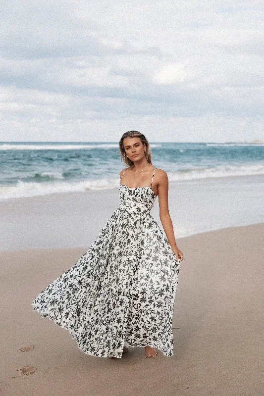 Simple yet elegant party dresses for weddings -Achanti Pleated Maxi Dress - White Black Floral