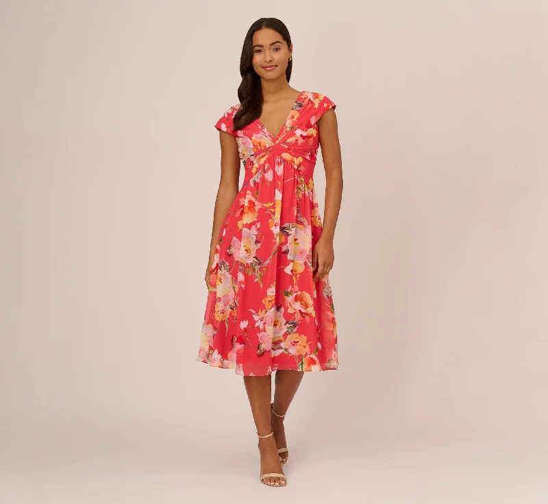 Spring dresses with open-back designs for a daring look -Floral Print Midi Dress With Twist Neckline In Coral Multi