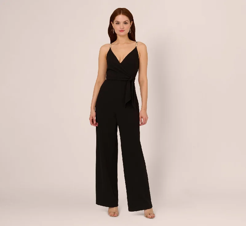 Spring dresses with a satin finish for a luxe feel -Wide Leg Jumpsuit With Pearl Chain Spaghetti Straps In Black