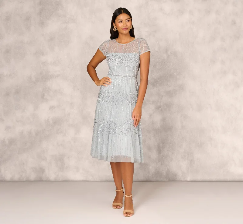 Best wedding guest dresses for weddings with traditional themes -Beaded Short Sleeve Midi Dress With Sheer Details In Snow Globe