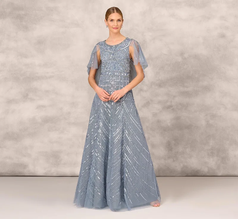 formal dresses with embroidered beadwork for luxury appeal --Beaded Ball Gown With Cape Sleeves In Vintage Blue