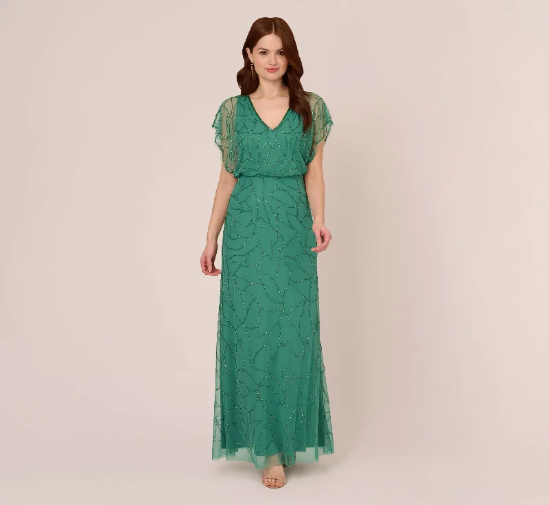 formal dresses with open backs and crisscross straps --Beaded Blouson Mermaid Gown With Sheer Dolman Sleeves In Jungle Green