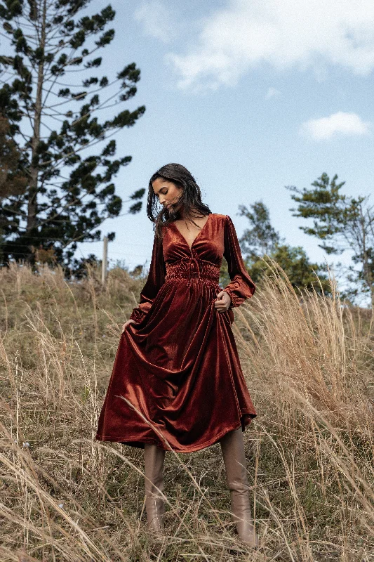 Affordable wedding guest dresses that look luxurious -Cece Velvet Long Sleeve Maxi Dress - Rust