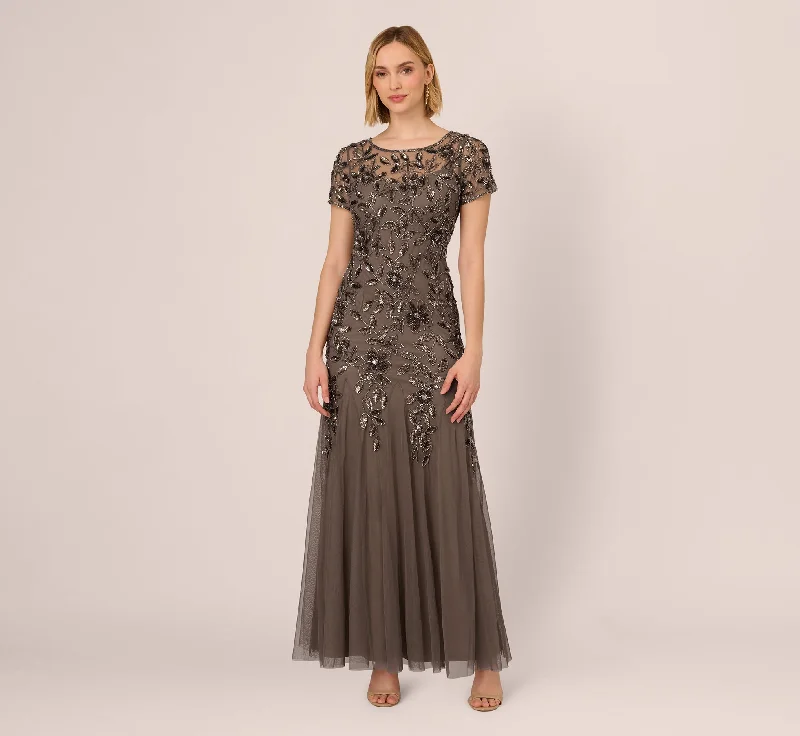 formal dresses with satin sashes for waist accentuation --Hand Beaded Short Sleeve Floral Godet Gown In Lead